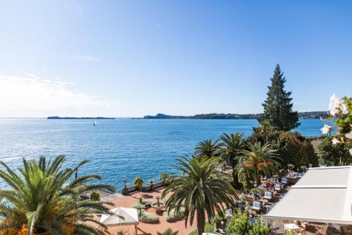 a view of the ocean from a resort at Grand Hotel Fasano & Villa Principe in Gardone Riviera