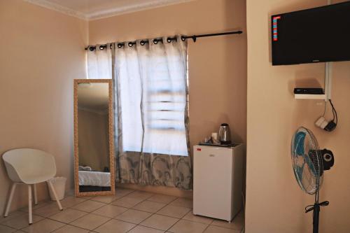 TV a/nebo společenská místnost v ubytování My Guesthouse
