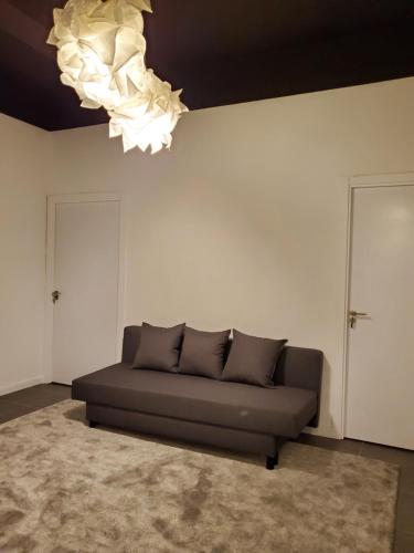Ruang duduk di Small and Cozy Rooms - G