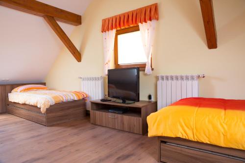 En eller flere senge i et værelse på Charming countryside house