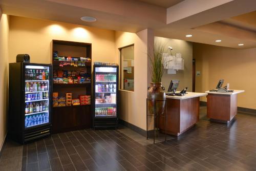 a convenience store with two refrigerators and a drink cooler at Holiday Inn Express & Suites Globe by IHG in Globe