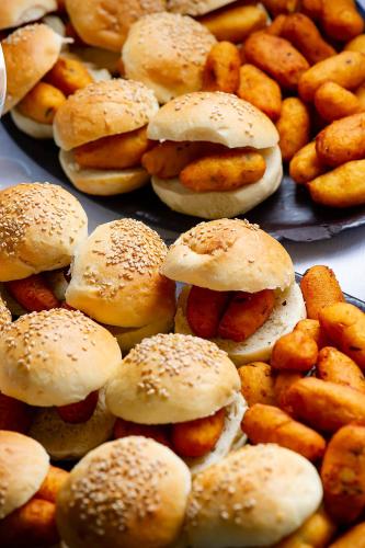 a bunch of sandwiches and some french fries at Principe Alogna Hotel & SPA in Altavilla Milicia