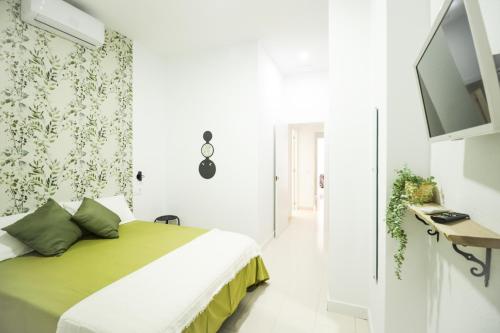 Posteľ alebo postele v izbe v ubytovaní Parigi Hotel bed and Breakfast