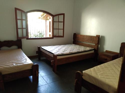 Postelja oz. postelje v sobi nastanitve Sitio Mogi das Cruzes