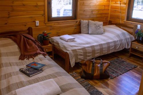 En eller flere senge i et værelse på Maciejówka Borki 33