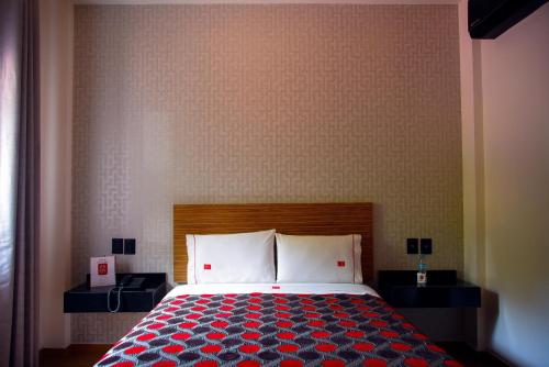 Ein Bett oder Betten in einem Zimmer der Unterkunft Six Hotel Guadalajara Expiatorio