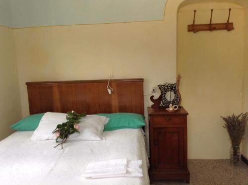 Giường trong phòng chung tại All'ombra del Castello