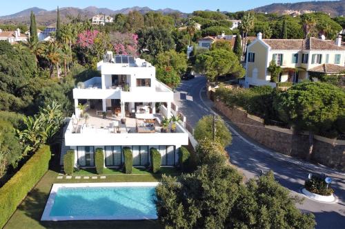 an aerial view of a house with a swimming pool at Casa Bodhi Boutique Hotel & Spa in Marbella