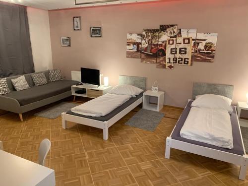 Зона вітальні в AschaffApartment 4 Schlafzimmer bis 10 Personen bei Aschaffenburg