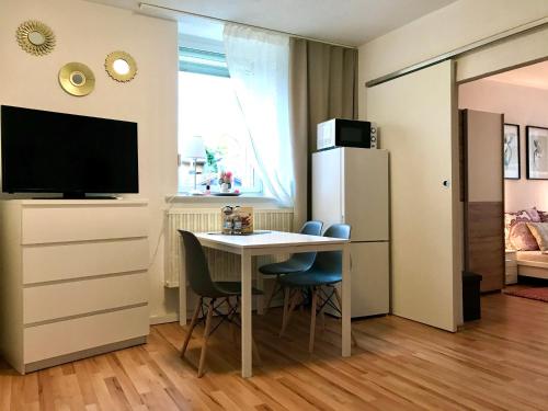 TV i/ili zabavni centar u objektu No2 TOP Apartment4YOU - 3 Zimmer, 1-6 Pers, Saarbrücken - Jägersfreude Saarbruecken