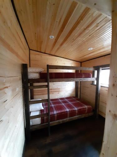 A bunk bed or bunk beds in a room at Deer Creek Pony Express Cabin