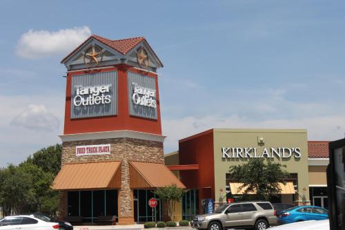 a building with a clock tower on top of it at Holiday Inn Express & Suites New Braunfels, an IHG Hotel in New Braunfels