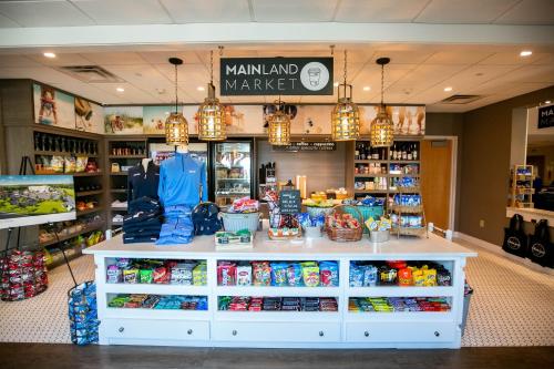 a store with a counter in a store at Holiday Inn Manahawkin/Long Beach Island by IHG in Manahawkin