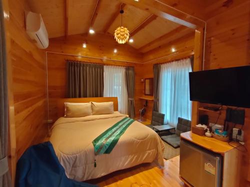 Postel nebo postele na pokoji v ubytování Soundless Resort