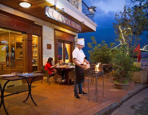 Un restaurante o sitio para comer en Cosiana Sapa Hotel