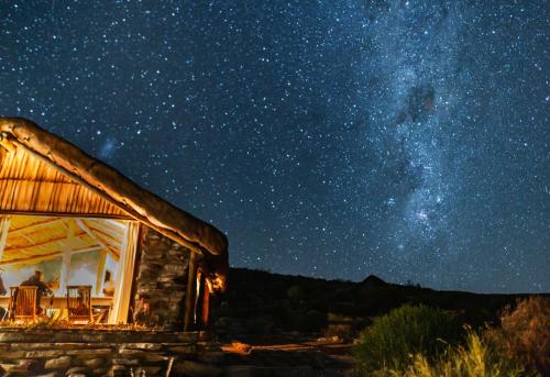 a cabin with the milky way in the sky at Oudrif Farm in Clanwilliam