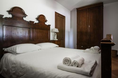 Ένα ή περισσότερα κρεβάτια σε δωμάτιο στο Agriturismo Dominio di Bagnoli
