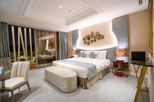 Gulta vai gultas numurā naktsmītnē Vivienda Hotel Villas, Jeddah