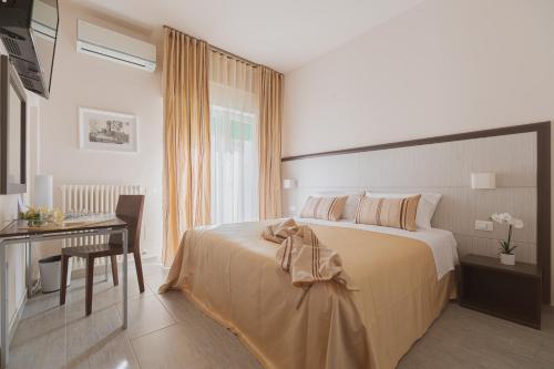 A bed or beds in a room at La Maison Di Carla