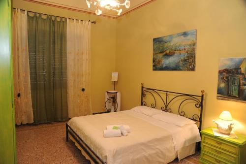 Ένα ή περισσότερα κρεβάτια σε δωμάτιο στο Bed and Breakfast Su Niu