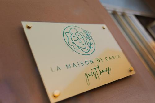 a sign for the la mission do chi chi synagogue at La Maison Di Carla in Ancona