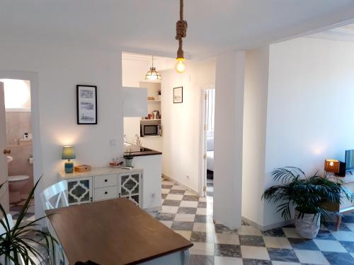 Kuchyň nebo kuchyňský kout v ubytování Apartamento Puerta al Mar