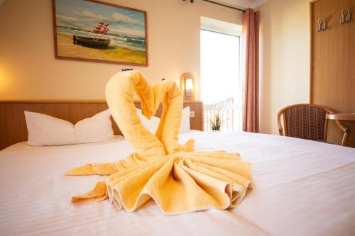 Pension Erdmann - Hotel Garniにあるベッド