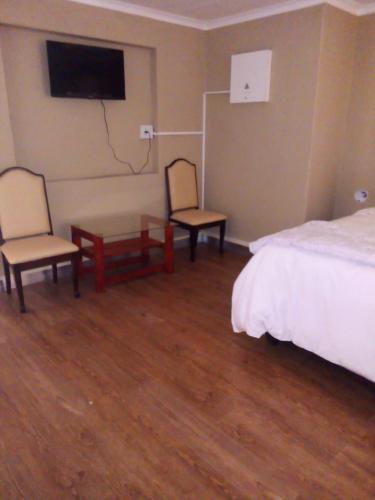 Ένα ή περισσότερα κρεβάτια σε δωμάτιο στο Lior-Gil accommodation-