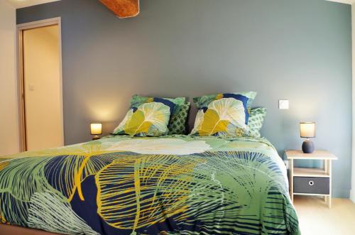 Ένα ή περισσότερα κρεβάτια σε δωμάτιο στο La maison de Michelle