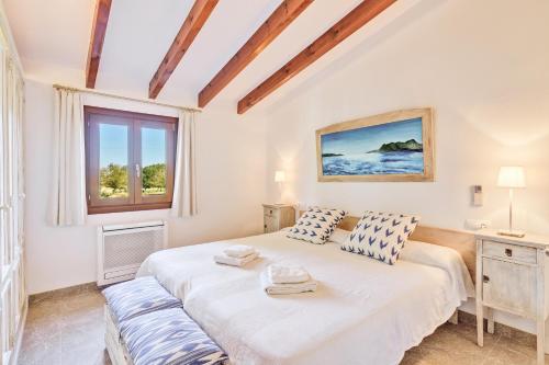 A bed or beds in a room at Finca El Clos