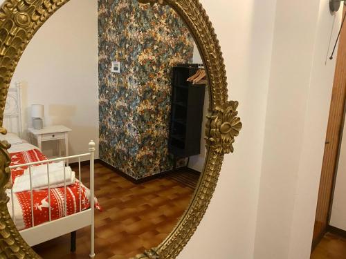 Ένα ή περισσότερα κρεβάτια σε δωμάτιο στο B&B Villa Reginella
