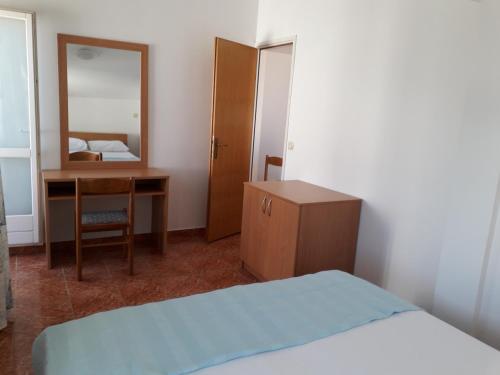 Apartments Miljenko tesisinde bir odada yatak veya yataklar