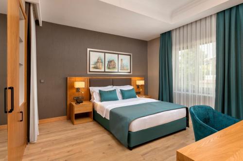 Cama o camas de una habitación en Pukka Hotel