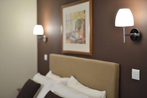 Ένα ή περισσότερα κρεβάτια σε δωμάτιο στο Hotel Salgueiro