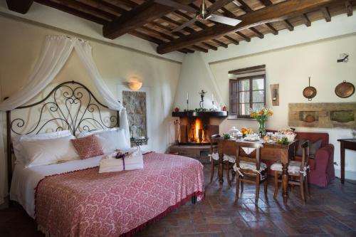 Ένα ή περισσότερα κρεβάτια σε δωμάτιο στο Agriturismo Cretaiole