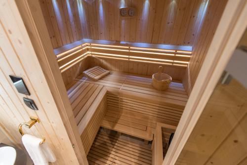 an inside view of a sauna with a bucket at Suites Kod Guste in Sukošan