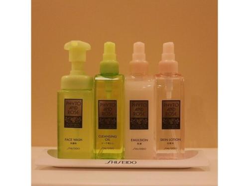 a group of four bottles of soap on a shelf at OGAL INN - Vacation STAY 01883v in Akaishi