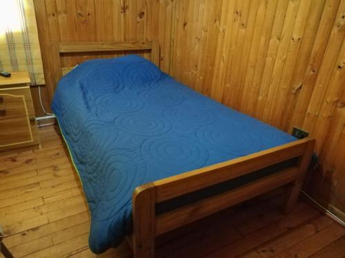 Hostal Casona del Cerroにあるベッド
