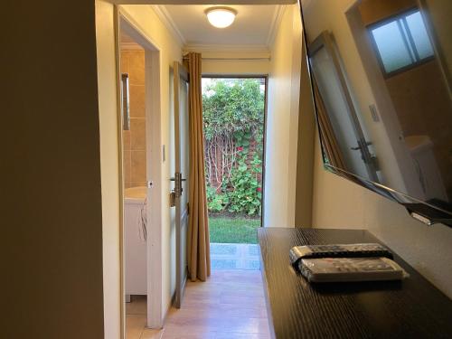 TV a/nebo společenská místnost v ubytování Hostal del Valle