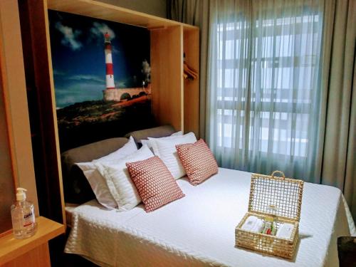 Cama ou camas em um quarto em Salvador Mondial Flats