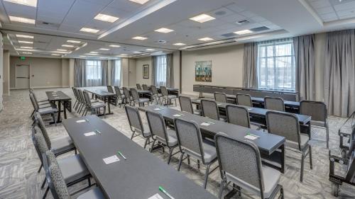 a conference room with tables and chairs in it at Holiday Inn & Suites Bellingham by IHG in Bellingham
