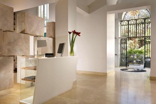 Posezení v ubytování Palazzo Montemartini Rome, A Radisson Collection Hotel