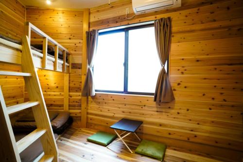 Katil dua tingkat atau katil-katil dua tingkat dalam bilik di Ise Guest House Kazami