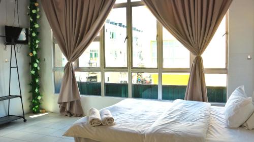 Кровать или кровати в номере Ihome Boutique Hotel