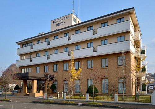 室蘭市にある第二プリンスホテル室蘭ビューの上に看板がある建物