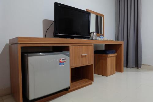 Μια τηλεόραση ή/και κέντρο ψυχαγωγίας στο Prada Apartment