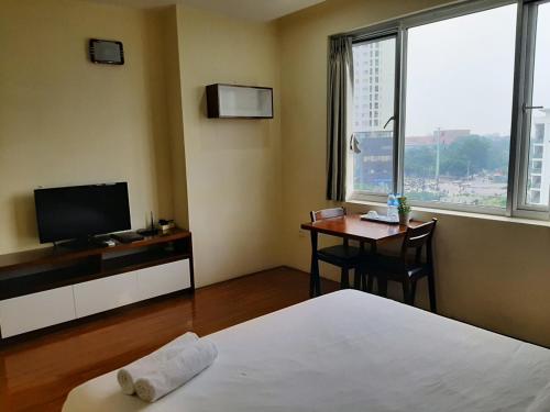Μια τηλεόραση ή/και κέντρο ψυχαγωγίας στο V-Studio Apartment 3