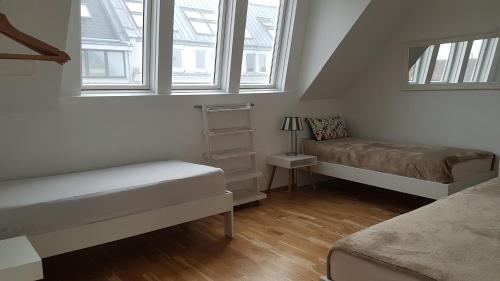 Postel nebo postele na pokoji v ubytování Moderne Maisonette mit Terrasse