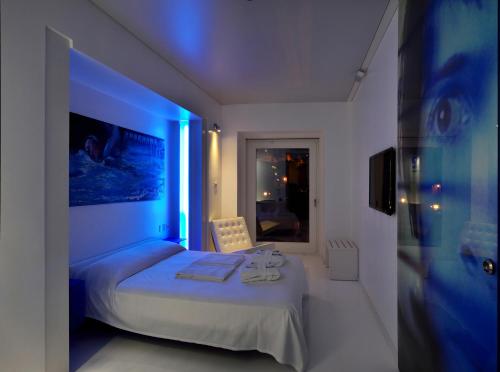 Postel nebo postele na pokoji v ubytování San Giorgio Modica Hotel