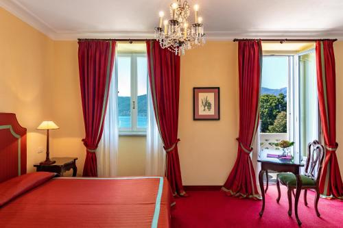 Postel nebo postele na pokoji v ubytování Grand Hotel Majestic